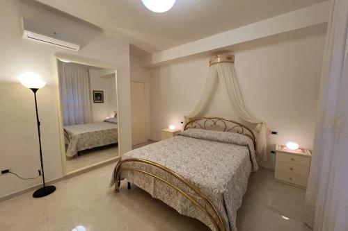 Ένα ή περισσότερα κρεβάτια σε δωμάτιο στο Lenuare Luxury Apartment