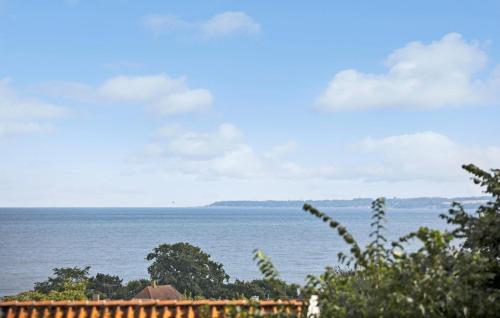 a view of the ocean from a house at Gudhjem Søpark Lejl 51 in Gudhjem
