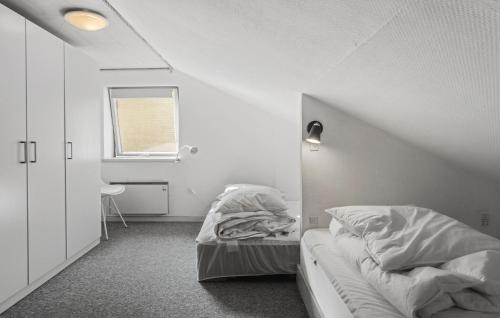 Ein Bett oder Betten in einem Zimmer der Unterkunft 3 Bedroom Beautiful Home In Borre