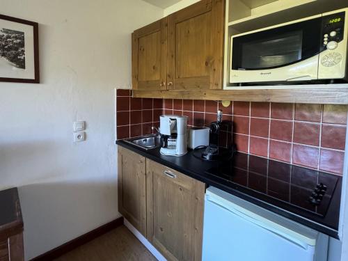 Appartement au pied des pistes avec balcon et casier à skis