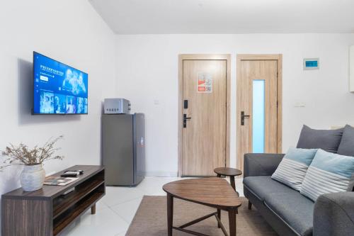 a living room with a couch and a table at Sigma Base Apartments in Lagos