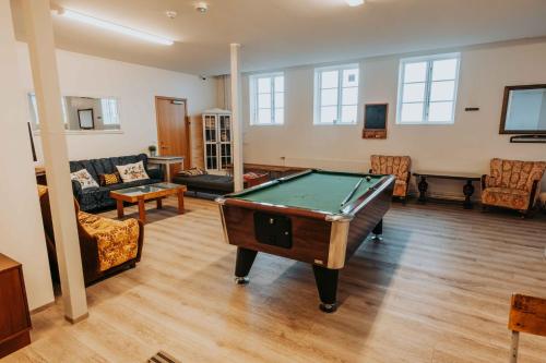 Posezení v ubytování Héradsskólinn Historic Guesthouse