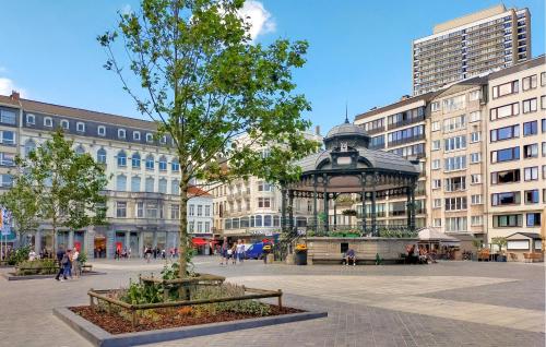 a gazebo in the middle of a city with buildings at 1 Bedroom Nice Apartment In Oostende in Ostend