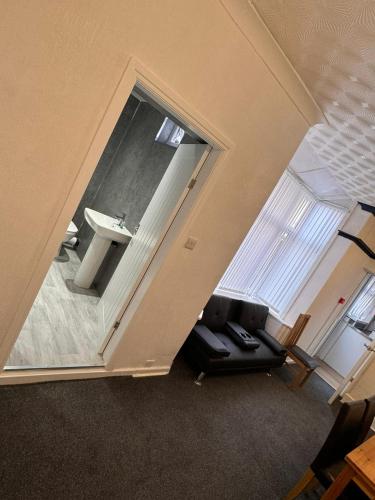 an overhead view of a living room with a sink at Pinnacle Hotel & Suites formerly Jean Martyn Hotel Near Central Blackpool, Near Beach & Attractions in Blackpool