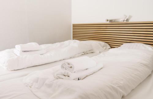 Кровать или кровати в номере Hotel Nordbo