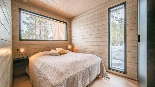 En eller flere senge i et værelse på Villa Saaga, Äkäslompolo, Ylläs