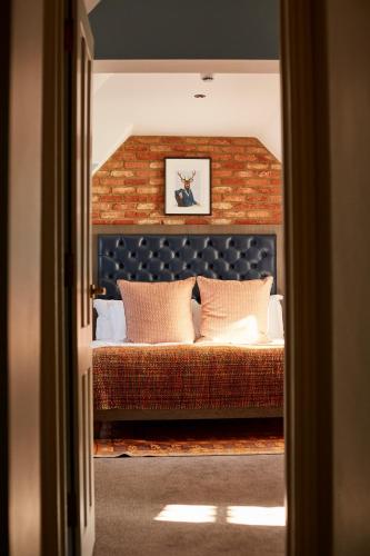 The Great House, Sonning, Berkshireにあるベッド