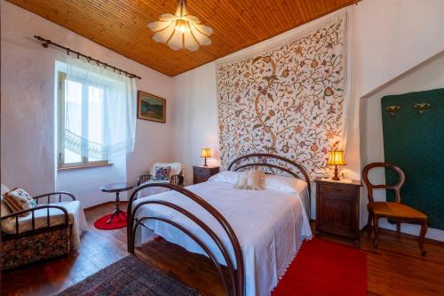 Postel nebo postele na pokoji v ubytování Limonta Lakeview Apartment by Wonderful Italy