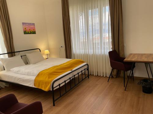 Postel nebo postele na pokoji v ubytování Friendly Home