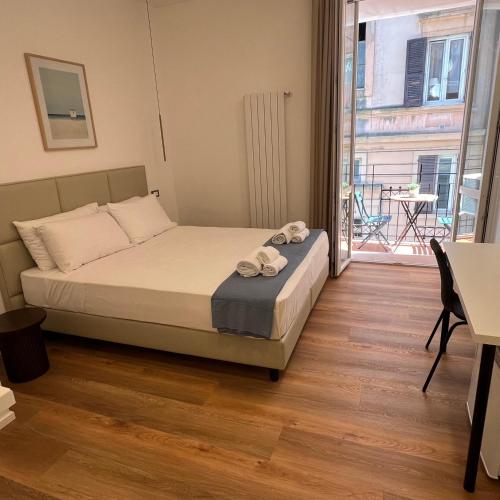 Postel nebo postele na pokoji v ubytování Sunrise Rooms