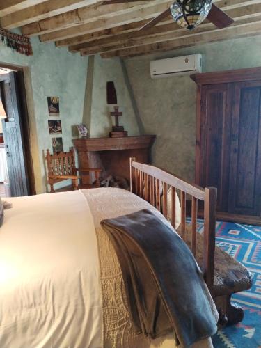 Cama o camas de una habitación en Hacienda Las Amantes