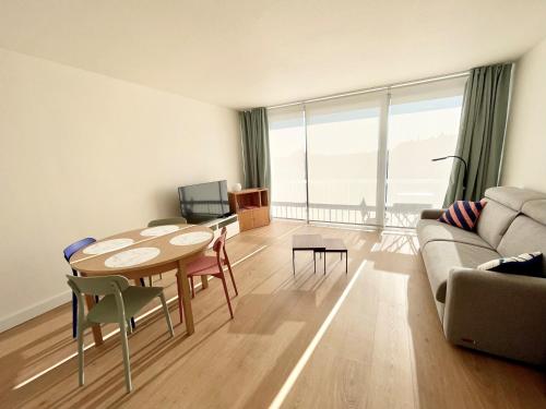 Χώρος καθιστικού στο Studio lumineux à 700 m de la plage