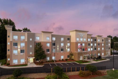 an artist rendering of a hotel planned for the campus at TownePlace Suites by Marriott Goldsboro in Goldsboro