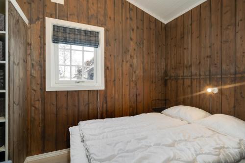 Una cama o camas en una habitación de Bitigrenda K