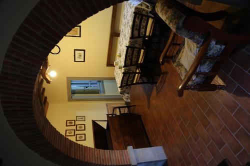 an overhead view of a spiral staircase in a house at Agriturismo La Scarpaia in Anghiari