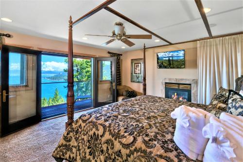 a bedroom with a bed and a fireplace at Lx10 lakeview jewel of sierra theater , hot tub in Zephyr Cove