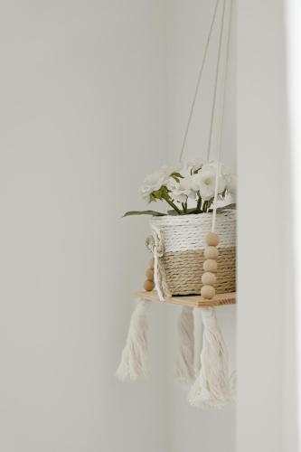 a basket with eggs and flowers on a swing at B&B VistaMare in Civitavecchia