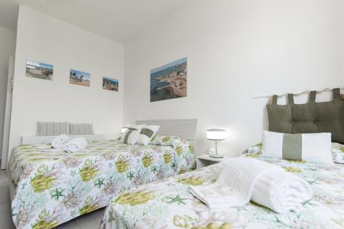 Postel nebo postele na pokoji v ubytování B&B VistaMare
