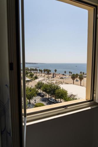 a view of the beach from a window at B&B VistaMare in Civitavecchia