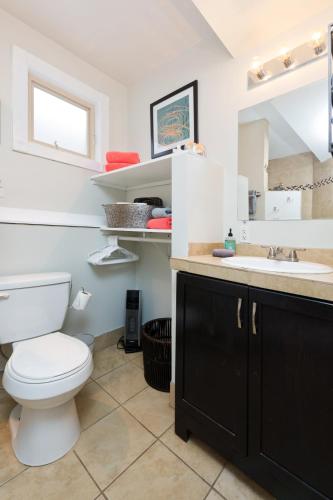 a bathroom with a toilet and a sink at #StayinMyDistrict Hyde Park Down in Boise