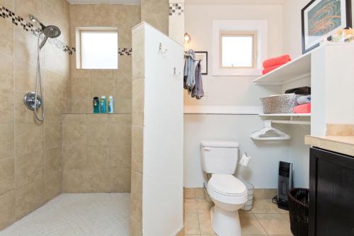 a bathroom with a shower and a toilet at #StayinMyDistrict Hyde Park Down in Boise