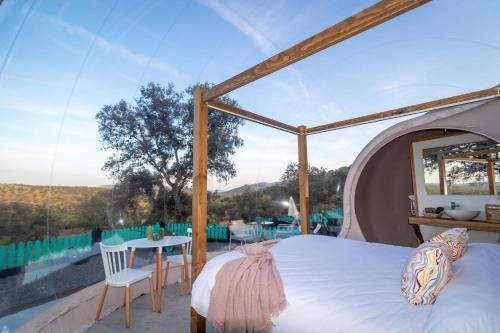 Ένα ή περισσότερα κρεβάτια σε δωμάτιο στο El Amanecer del Valle