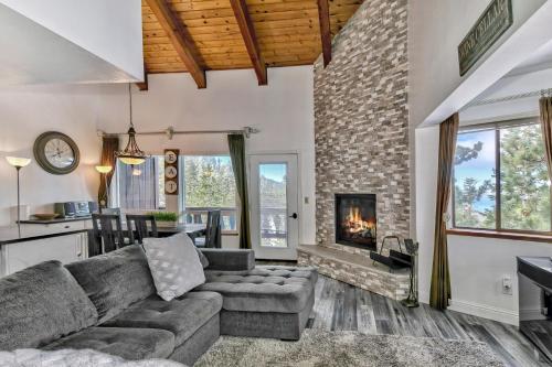 a living room with a couch and a fireplace at Mv17 amazing lake view spacious ski cabin in Stateline
