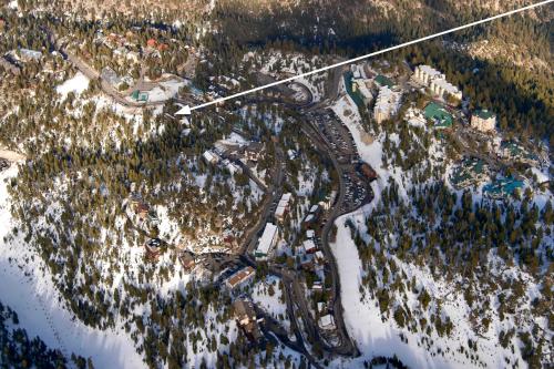 an aerial view of a town on a snowy mountain at Mv17 amazing lake view spacious ski cabin in Stateline