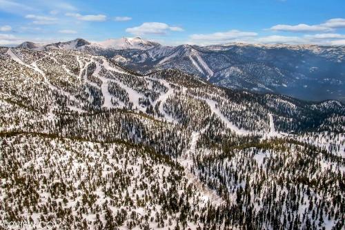 an aerial view of a snow covered mountain at Mv17 amazing lake view spacious ski cabin in Stateline