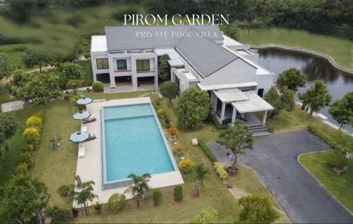an aerial view of a house with a swimming pool at Pirom Garden Private Villa in North Pattaya