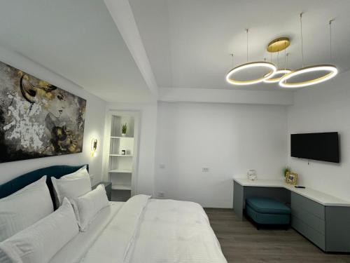 Ένα ή περισσότερα κρεβάτια σε δωμάτιο στο Central Suite