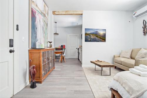 a living room with a couch and a table at 1BR Apt 8min St Anthony Monthly 15 Off #03C in Oklahoma City