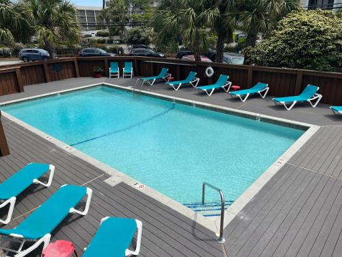 Swimmingpoolen hos eller tæt på Summer Sands - 105 by Sea Scape Properties