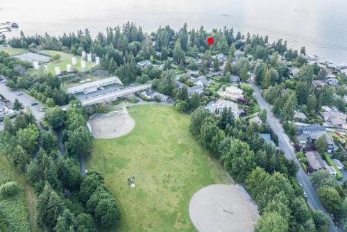 an aerial view of a park with a red balloon at Private park in a cozy home next to I-90 huge yard in Mercer Island