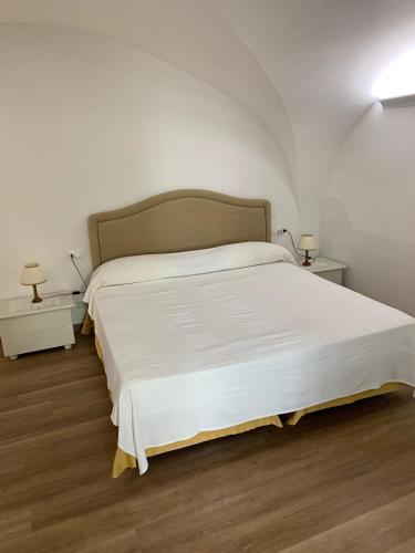 Ένα ή περισσότερα κρεβάτια σε δωμάτιο στο Cats House Centro Storico