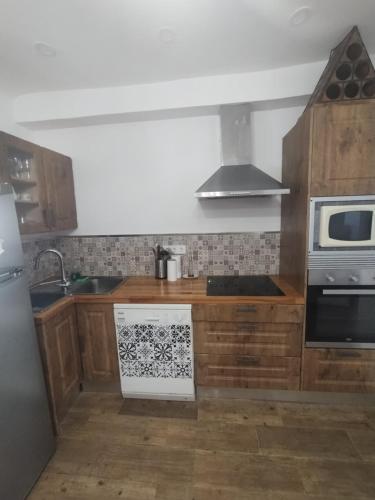 Kuchyň nebo kuchyňský kout v ubytování Casa rural con encanto