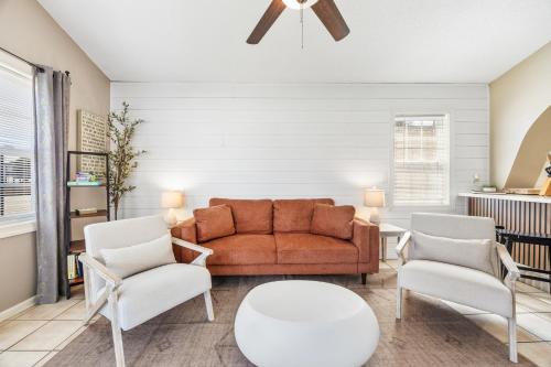 a living room with a couch and two chairs at Feel at Home a 3 Minute Walk from the Beach in Myrtle Beach