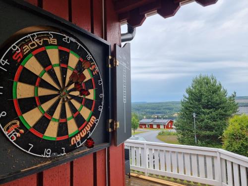a dart board on the side of a building at Sunne Stugcenter 12 in Gräsmark