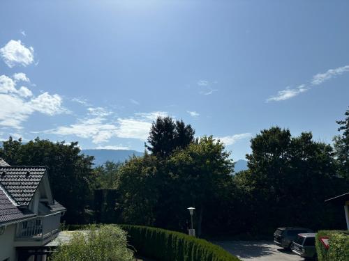 a view of the mountains from a house at Arcana Apartment in Seeboden