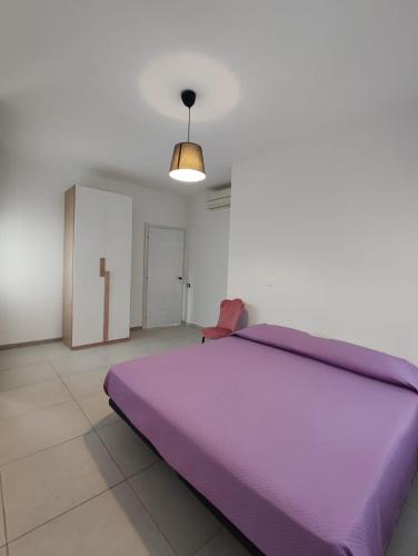 Postel nebo postele na pokoji v ubytování La suite di Carola