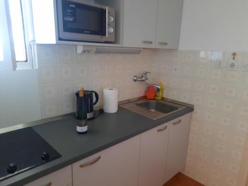 Kuchyň nebo kuchyňský kout v ubytování Apartments Polic