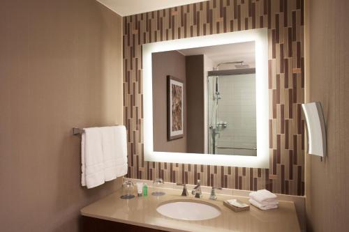 a bathroom with a sink and a mirror at The Westin Peachtree Plaza, Atlanta in Atlanta