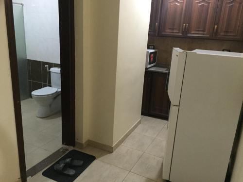 Ванная комната в Al Tawheed Hotel Apartments