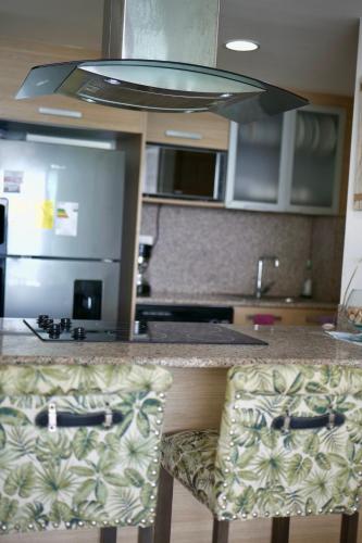 Dapur atau dapur kecil di MarbellaTower-JuanDolio-SEAVIEW-FRONTBEACH-Cozy-2BR-3BDS-6PAX-WiFi
