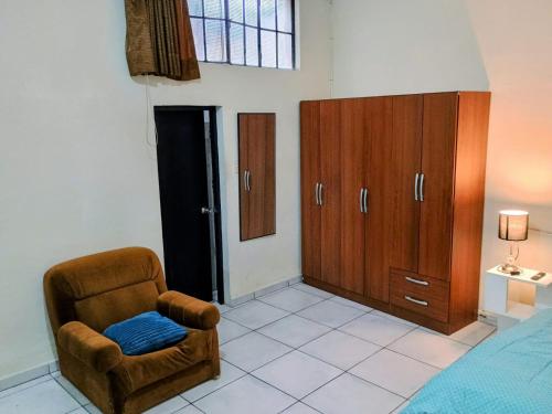 Postel nebo postele na pokoji v ubytování Tacna Guest House