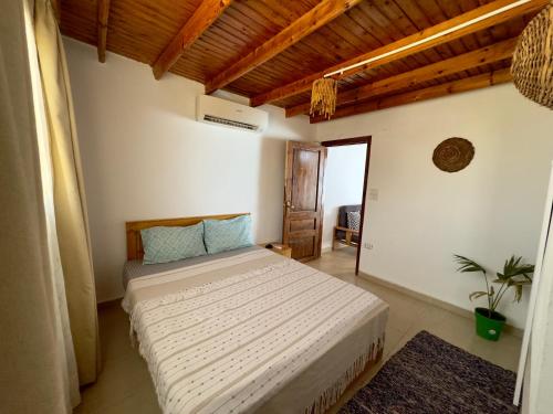 a bedroom with a bed in a room at Apartment with roof top in Dahab