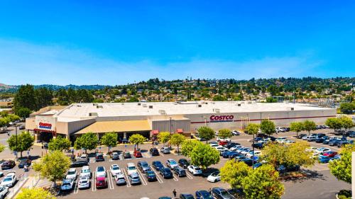 an aerial view of a store with a parking lot at 2Bedroom home - Marengo Estate in Alhambra