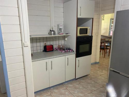Kuchyň nebo kuchyňský kout v ubytování Villa Simone