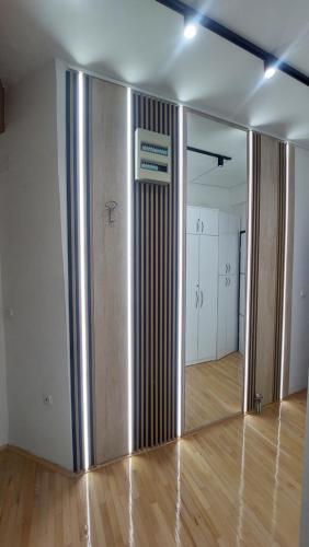 an empty room with a large door in the middle at Petreski Apartments 1 in Ohrid