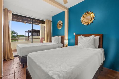 Tropical Gardens Suites and Apartmentsにあるベッド